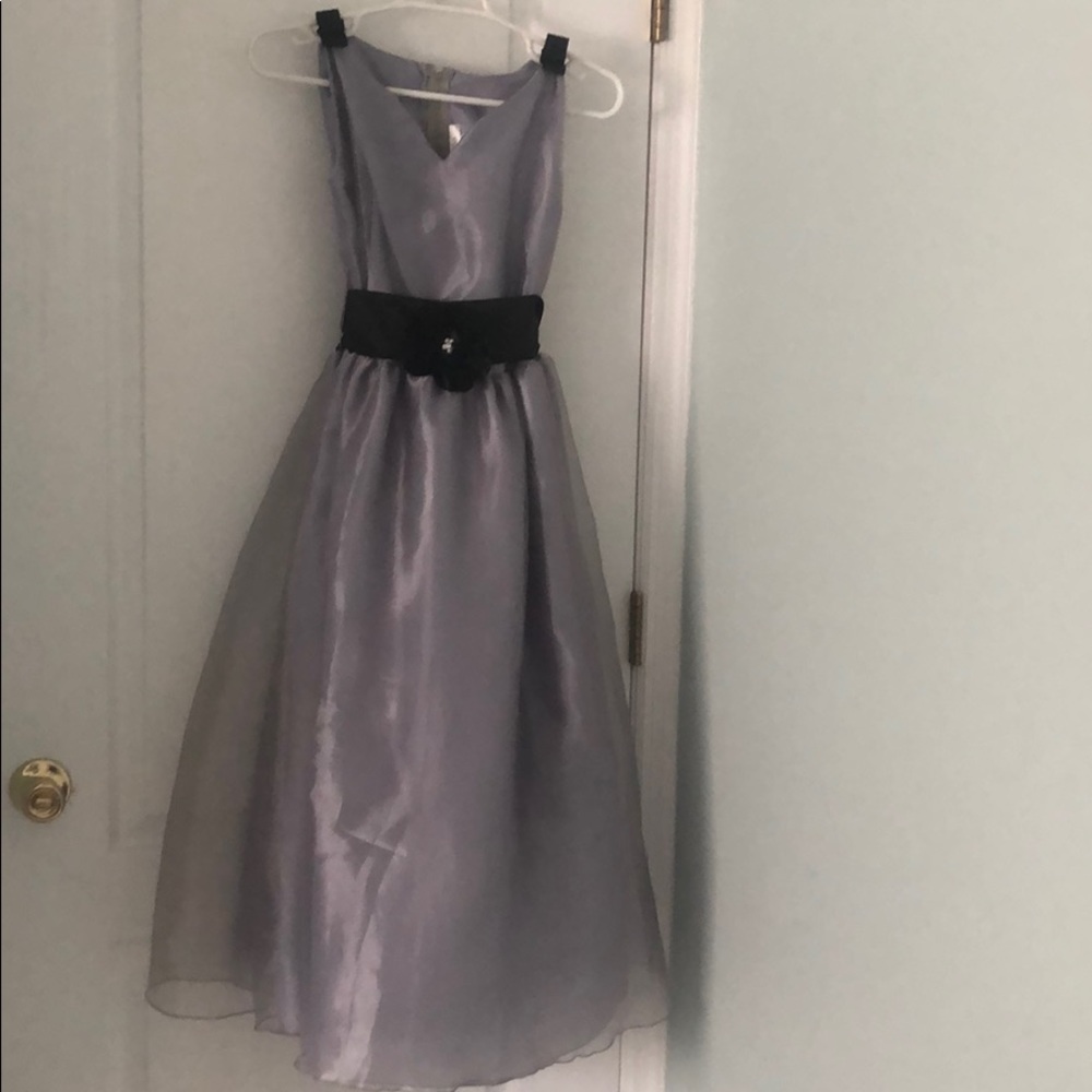 light grey dress with black decorative ribbon